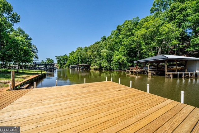 view of dock with a water view