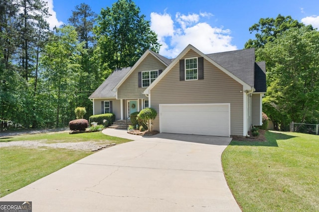 view of front of property featuring a garage and a front yard