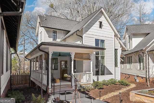 view of front facade featuring ceiling fan and covered porch