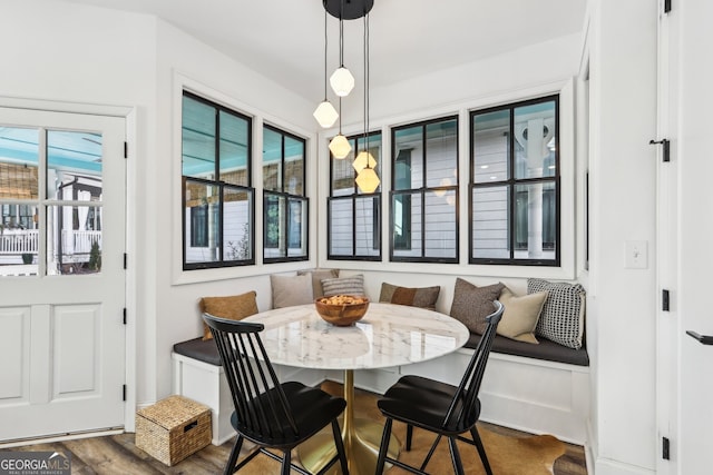 dining room featuring hardwood / wood-style floors and breakfast area