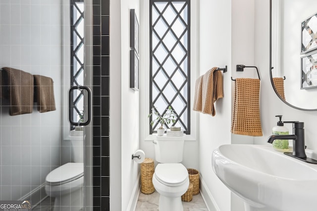 bathroom with sink and toilet