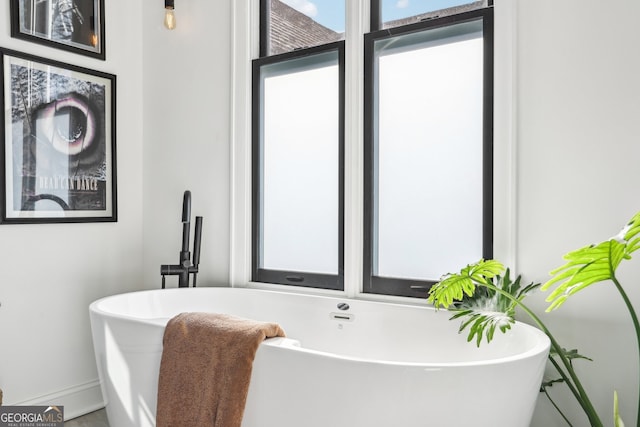 bathroom featuring a tub