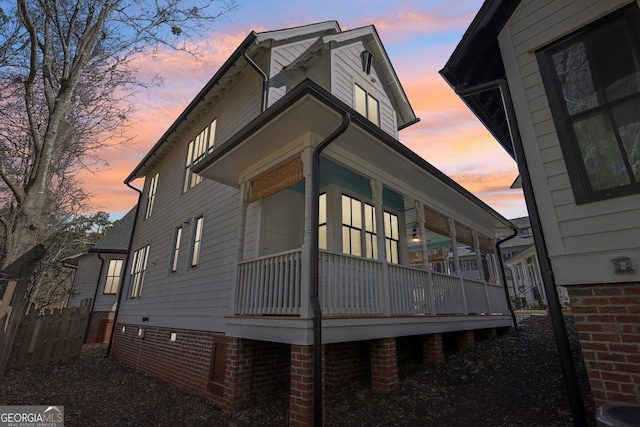 view of property exterior at dusk