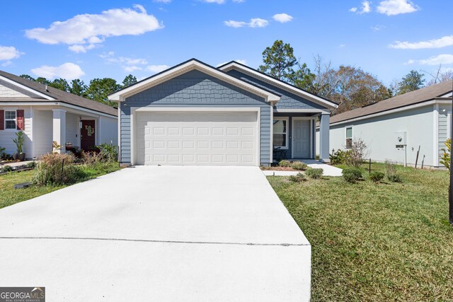 view of front of home with a garage and a porch