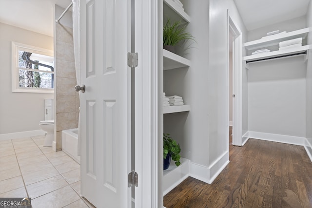 hallway with light tile patterned flooring