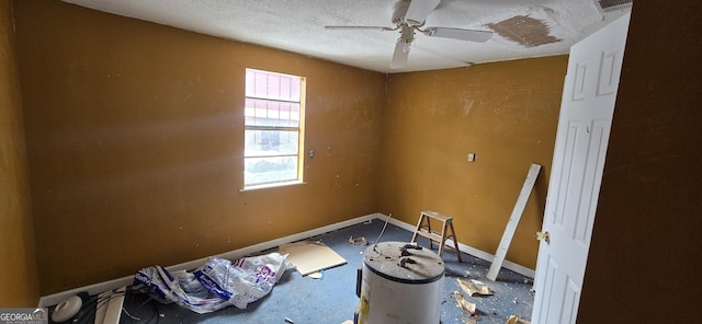 unfurnished room with a textured ceiling and ceiling fan