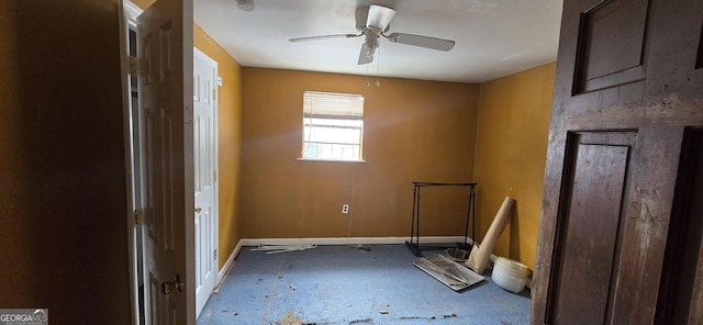 spare room with ceiling fan