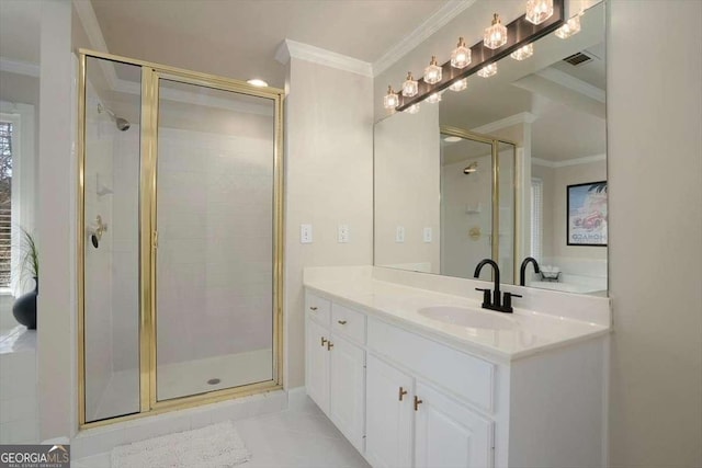 bathroom with vanity, crown molding, and a shower with door