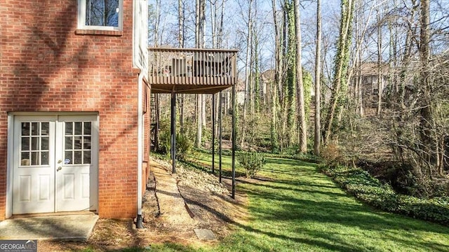 view of yard with french doors