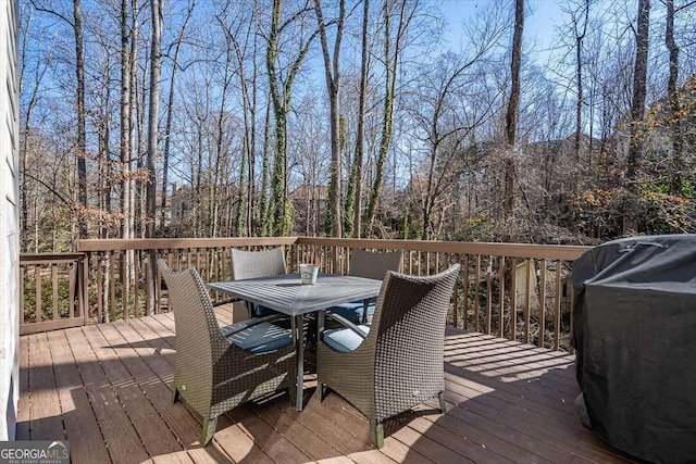 wooden terrace with grilling area