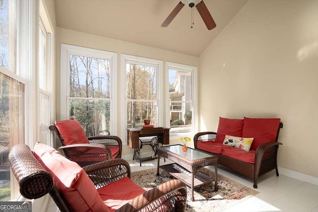 sunroom / solarium featuring lofted ceiling and ceiling fan