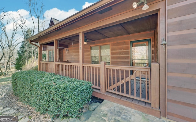 property entrance featuring covered porch