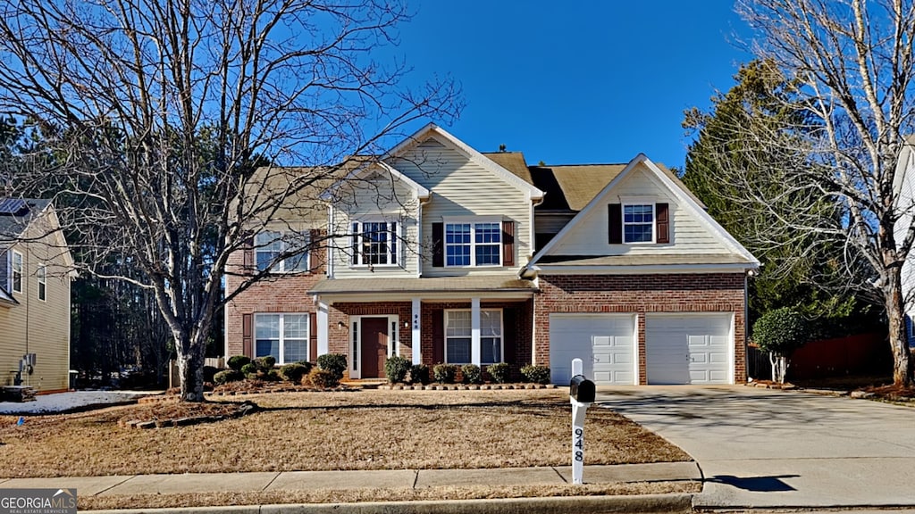 948 Maple Leaf Dr, Mcdonough, GA 30253 - view of front of property featuring a garage