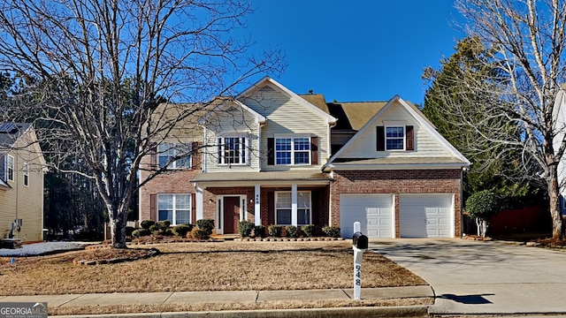 view of front of property featuring a garage