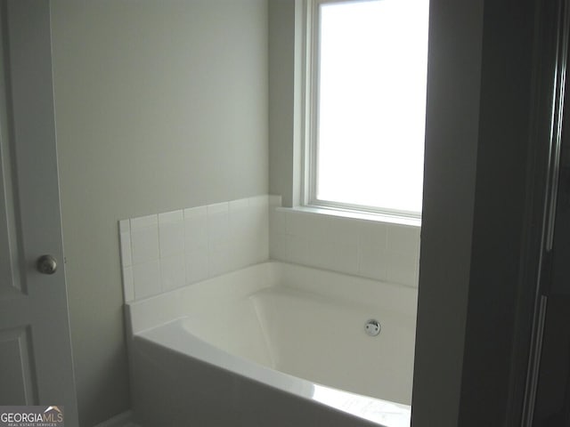 bathroom with a bathing tub