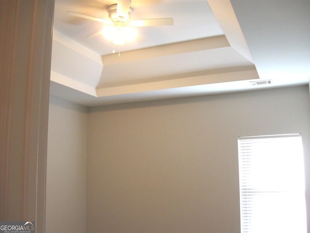 interior details featuring ceiling fan