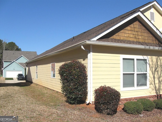 view of property exterior featuring a yard