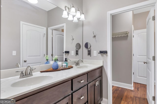 bathroom featuring vanity and wood-type flooring