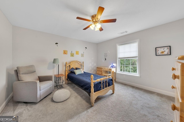 carpeted bedroom with ceiling fan