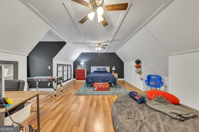 bedroom featuring lofted ceiling, hardwood / wood-style floors, and ceiling fan