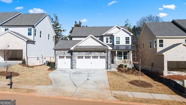 view of front of property featuring central AC unit, a garage, and a porch