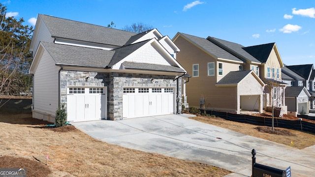 view of side of home with a garage