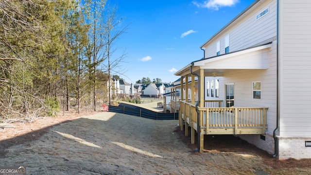 view of yard with a deck