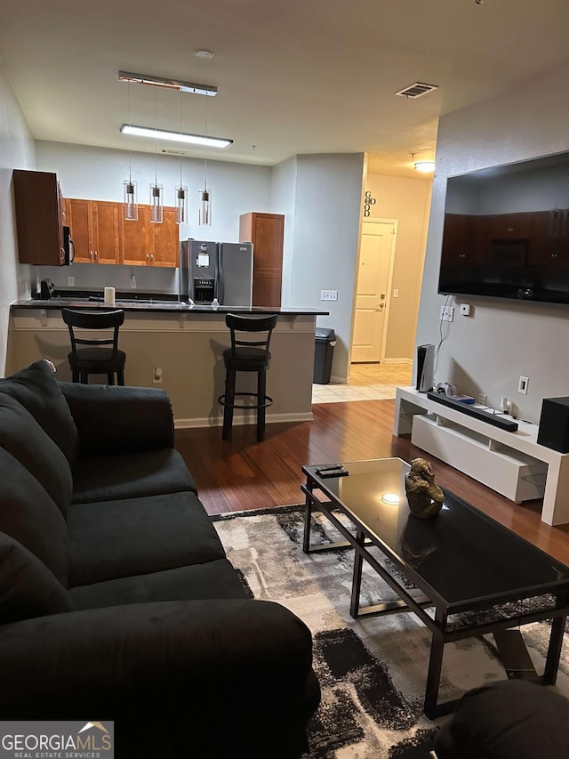 living room featuring light hardwood / wood-style floors