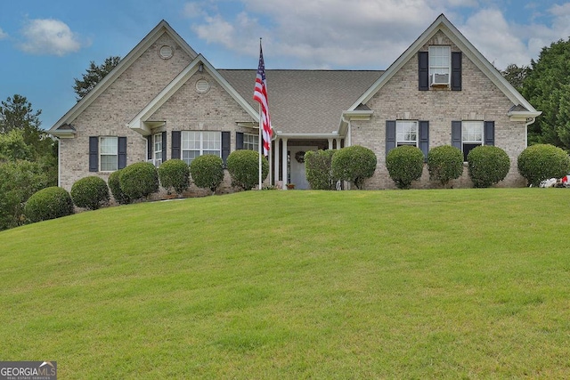 view of front of property with a front lawn