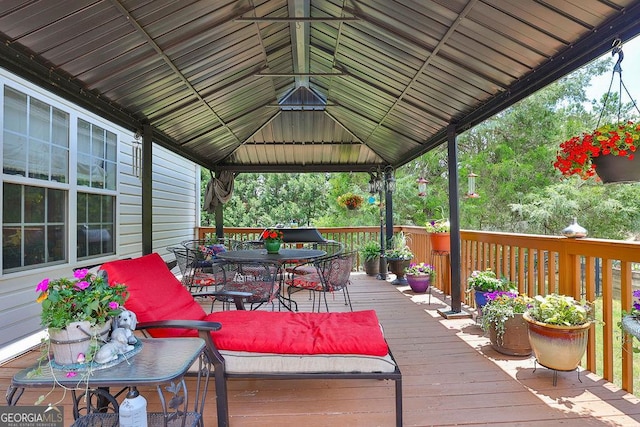 wooden terrace with a gazebo