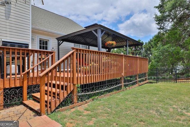 exterior space featuring a gazebo and a lawn