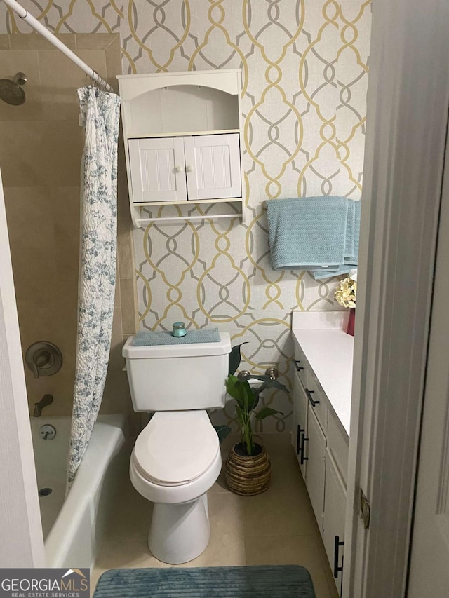 full bathroom featuring vanity, tile patterned flooring, toilet, and shower / bath combo