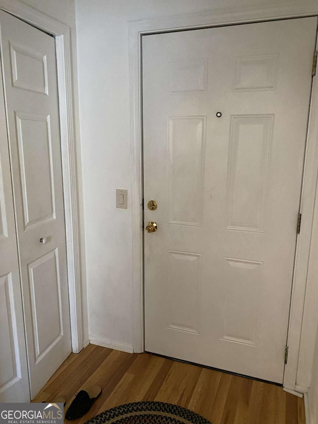 doorway to outside featuring hardwood / wood-style floors