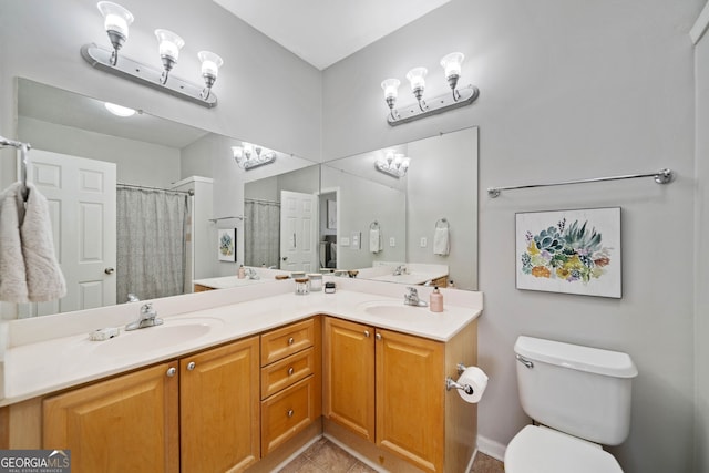 bathroom featuring a shower with curtain, vanity, and toilet