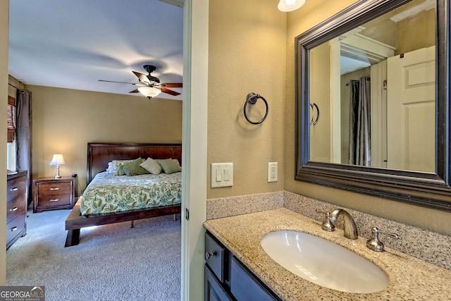 bathroom featuring vanity and ceiling fan