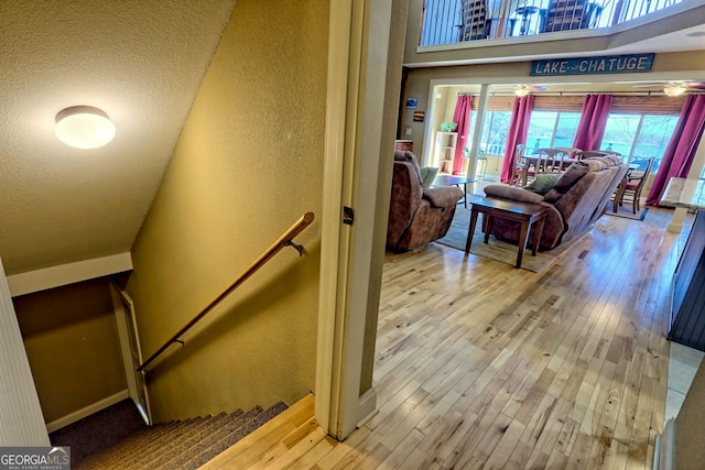 staircase featuring hardwood / wood-style floors