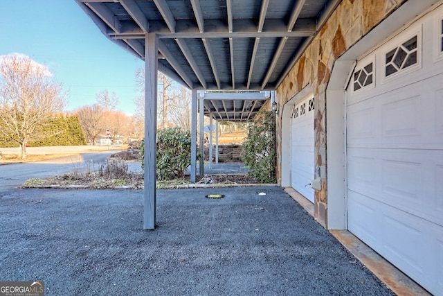 view of patio / terrace with a garage