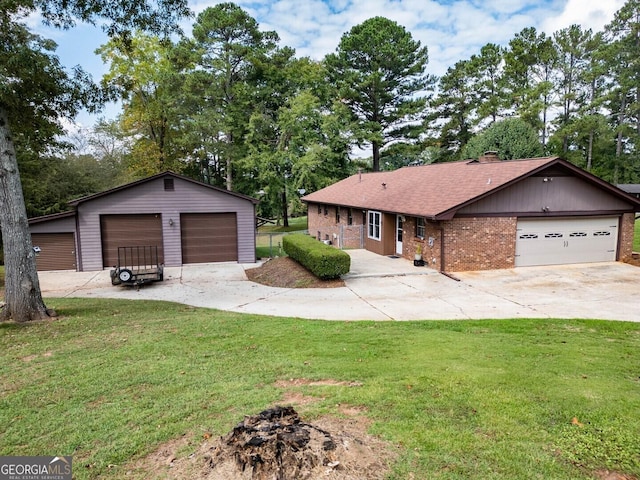 ranch-style home featuring brick siding, a detached garage, roof with shingles, an outdoor structure, and a front lawn