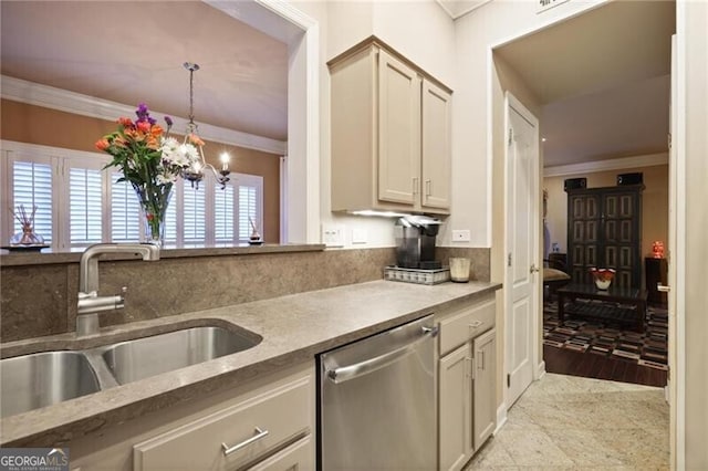 kitchen featuring sink, crown molding, an inviting chandelier, hanging light fixtures, and dishwasher