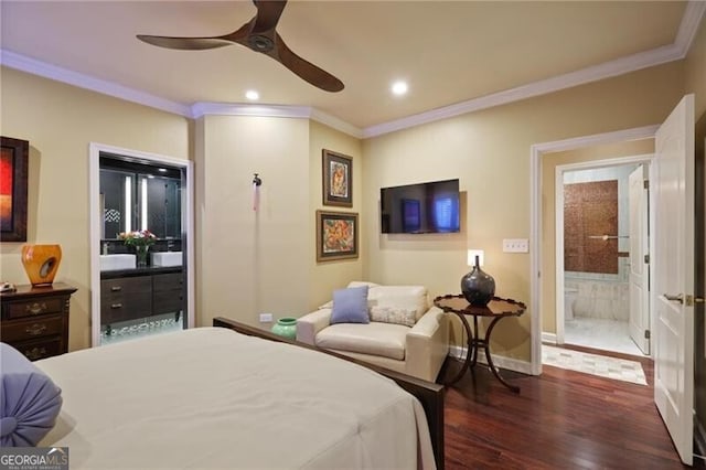 bedroom with crown molding, ceiling fan, ensuite bathroom, and dark wood-type flooring