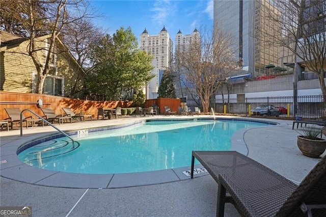 view of pool featuring a patio