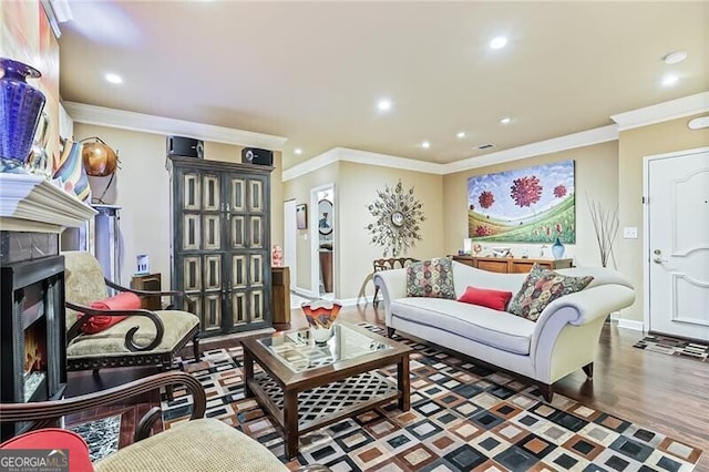 living room with crown molding, a premium fireplace, and dark hardwood / wood-style flooring