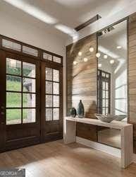 mudroom featuring french doors and light hardwood / wood-style floors