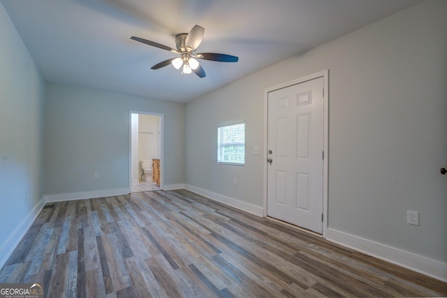 unfurnished room featuring ceiling fan and light wood-type flooring