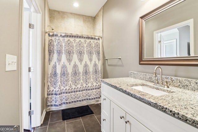 bathroom with vanity and tile patterned flooring