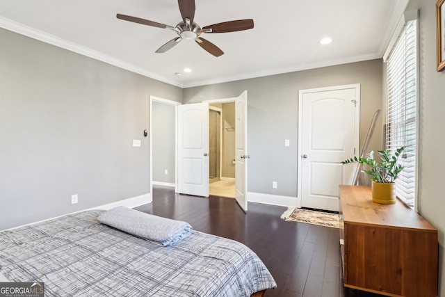 bedroom with crown molding, ceiling fan, and dark hardwood / wood-style flooring