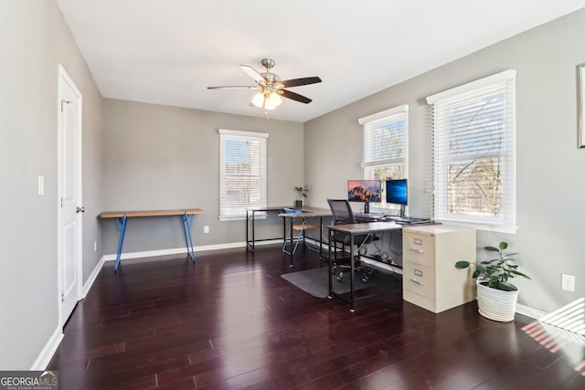 office with dark hardwood / wood-style floors and ceiling fan