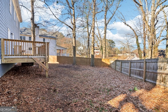 view of yard featuring a deck