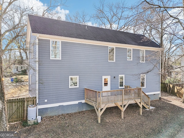 back of property featuring a deck