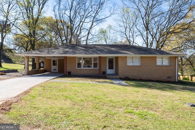 ranch-style house with a carport and a front lawn